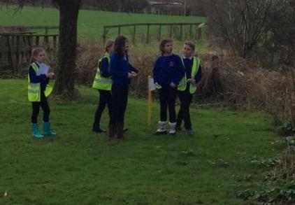 Learning to use a compass at Lower Stock Farm